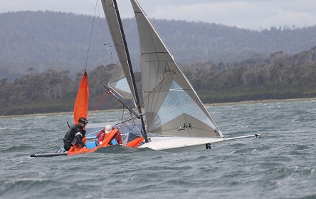 Orange_spinnaker_capsize_2